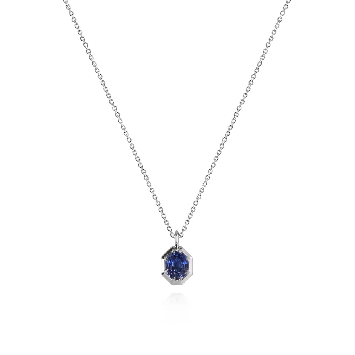 Blue sapphire pendant necklace with faceted dark-blue octagonal gemstone