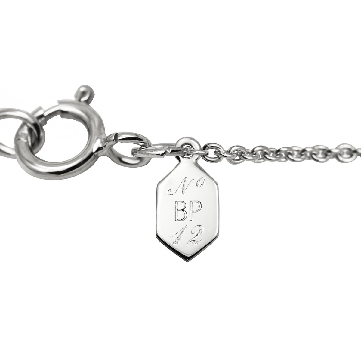 Silver chain necklace with clasp and engraved BP 12 charm tag