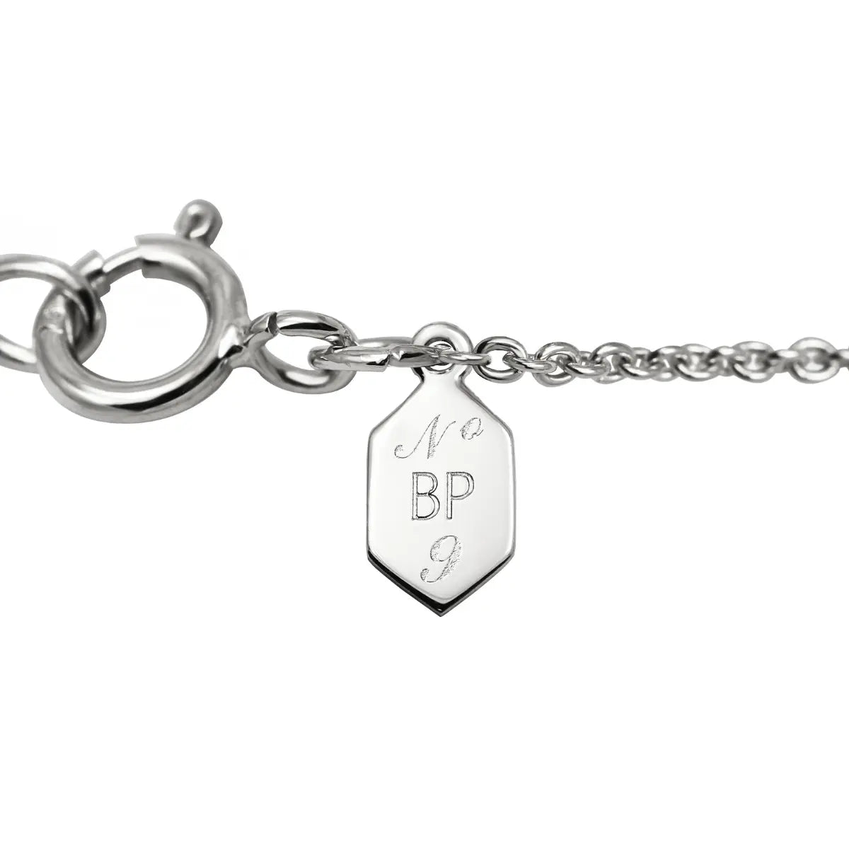 Silver-tone necklace clasp with engraved shield charm marked BP
