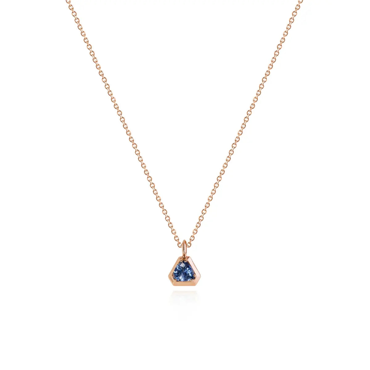 Rose-gold chain necklace with blue teardrop gemstone pendant