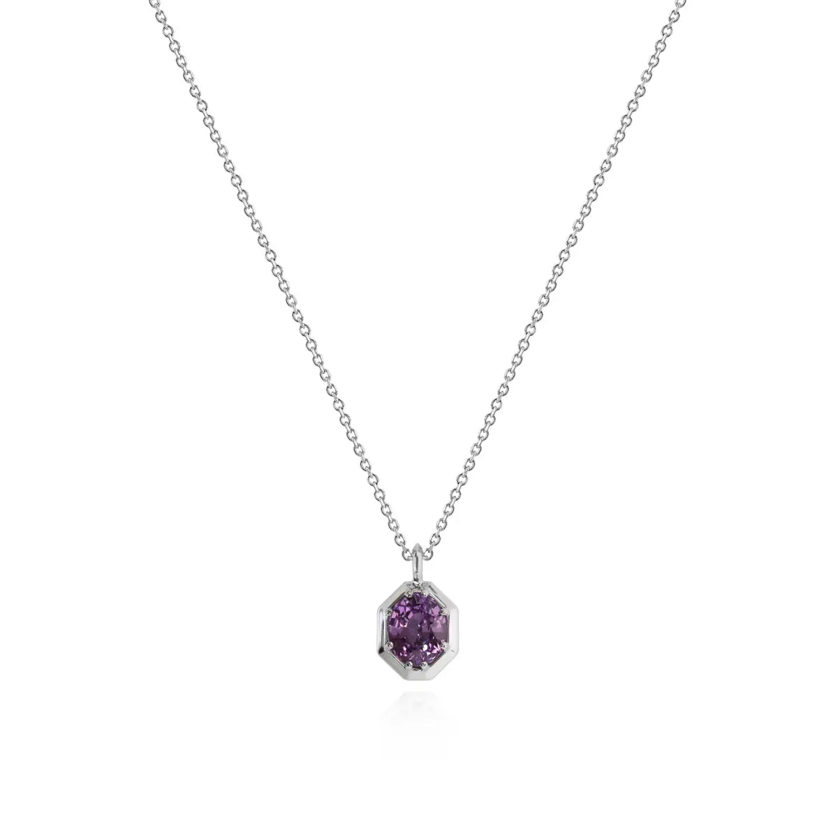Silver necklace with faceted purple octagon gemstone pendant on a chain