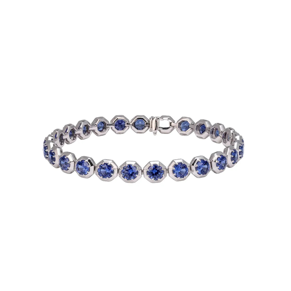 Sapphire blue round tennis bracelet with silver-toned prong settings and clasp
